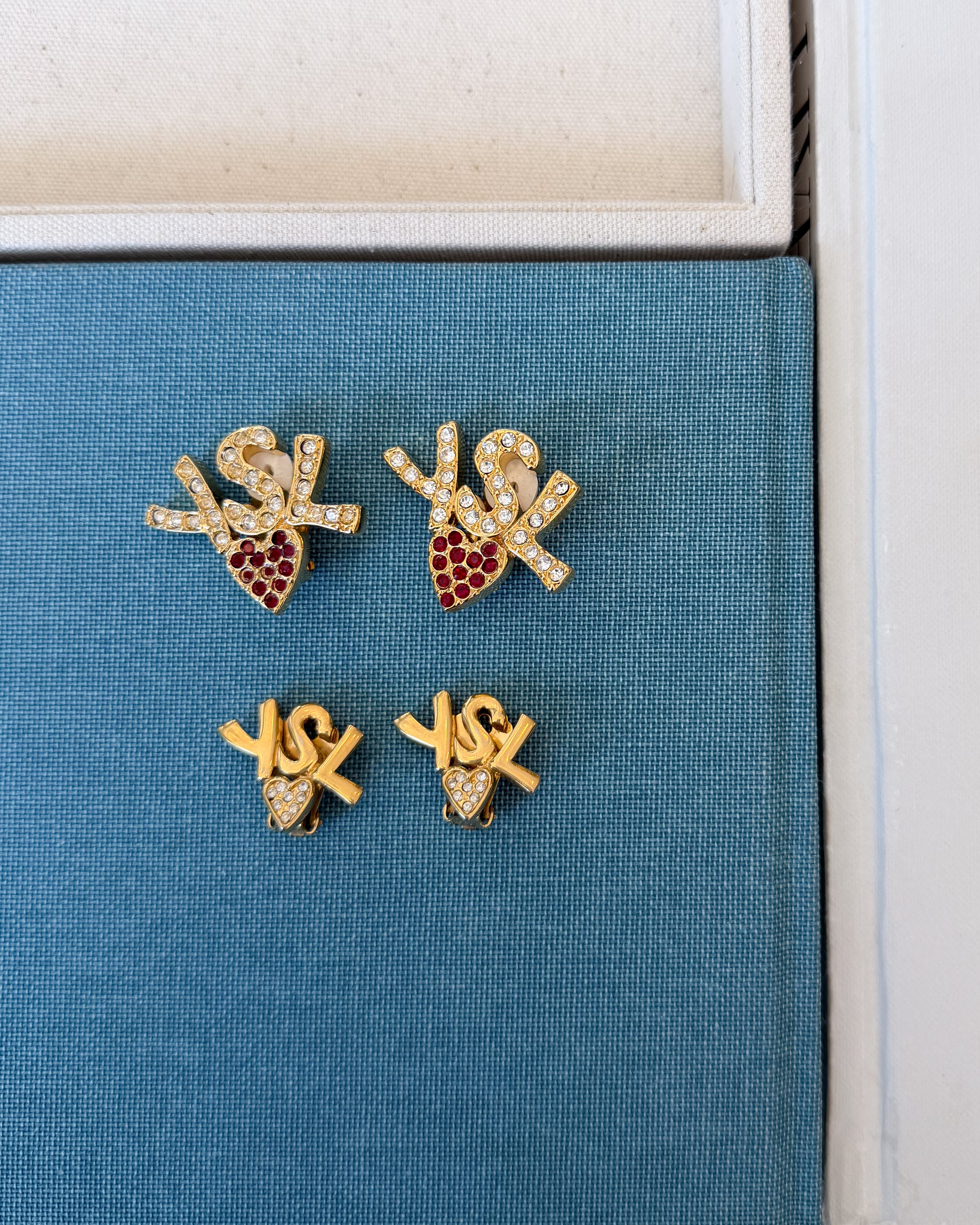 Yves Saint Laurent Vintage Gold-Tone YSL Logo Heart Clip-On Earrings with Red Crystals