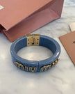 Miu Miu Blue Bangle with Gold Logo
