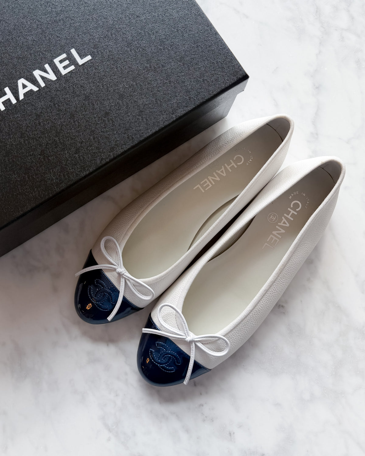 BRAND NEW Chanel Two-Tone White Leather & Patent Blue Toe Ballet Flats (38.5)