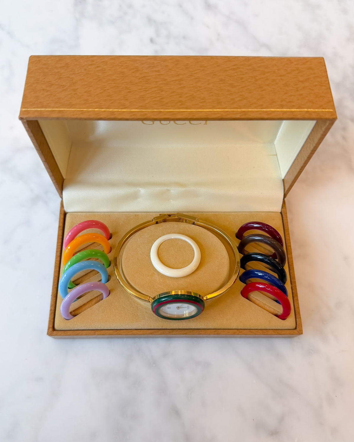 Vintage Gucci 345 Gold Bangle Watch with 12 Interchangeable Bezels & Box
