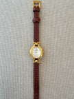 Vintage Fendi Gold Tone Watch with Brown Leather Strap